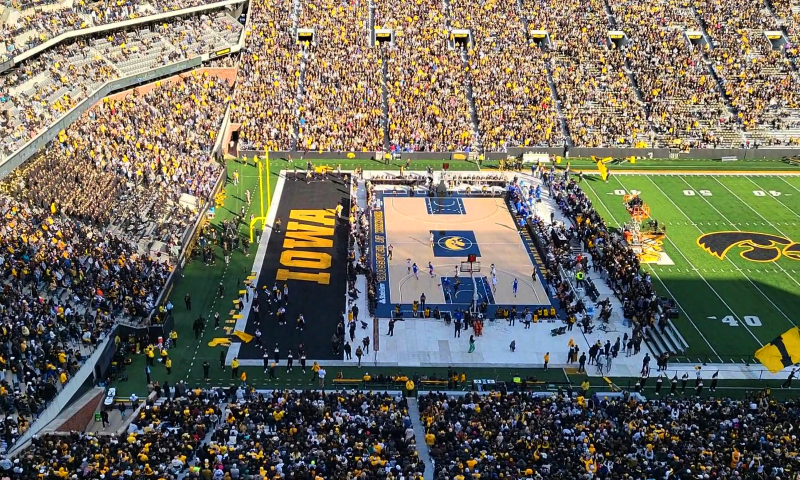 Iowa women's basketball game taking place in a stadium full of fans