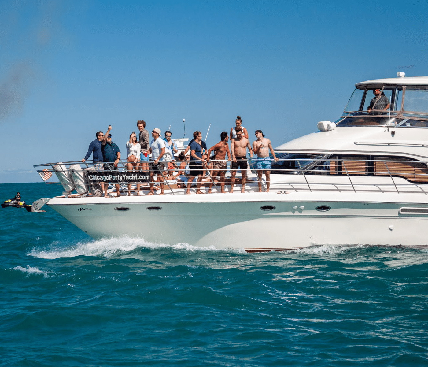 People partying on the deck of a large boat